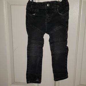 Distressed moto jeans